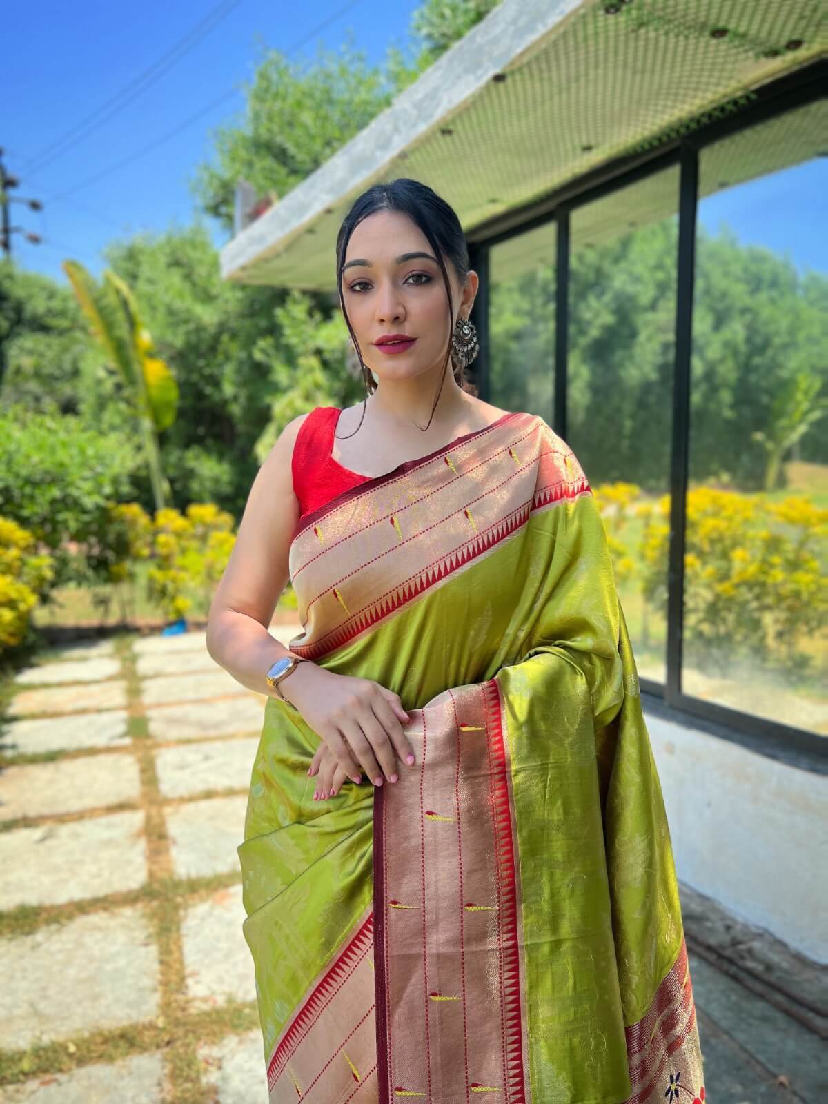 gorgeous green and red border saree