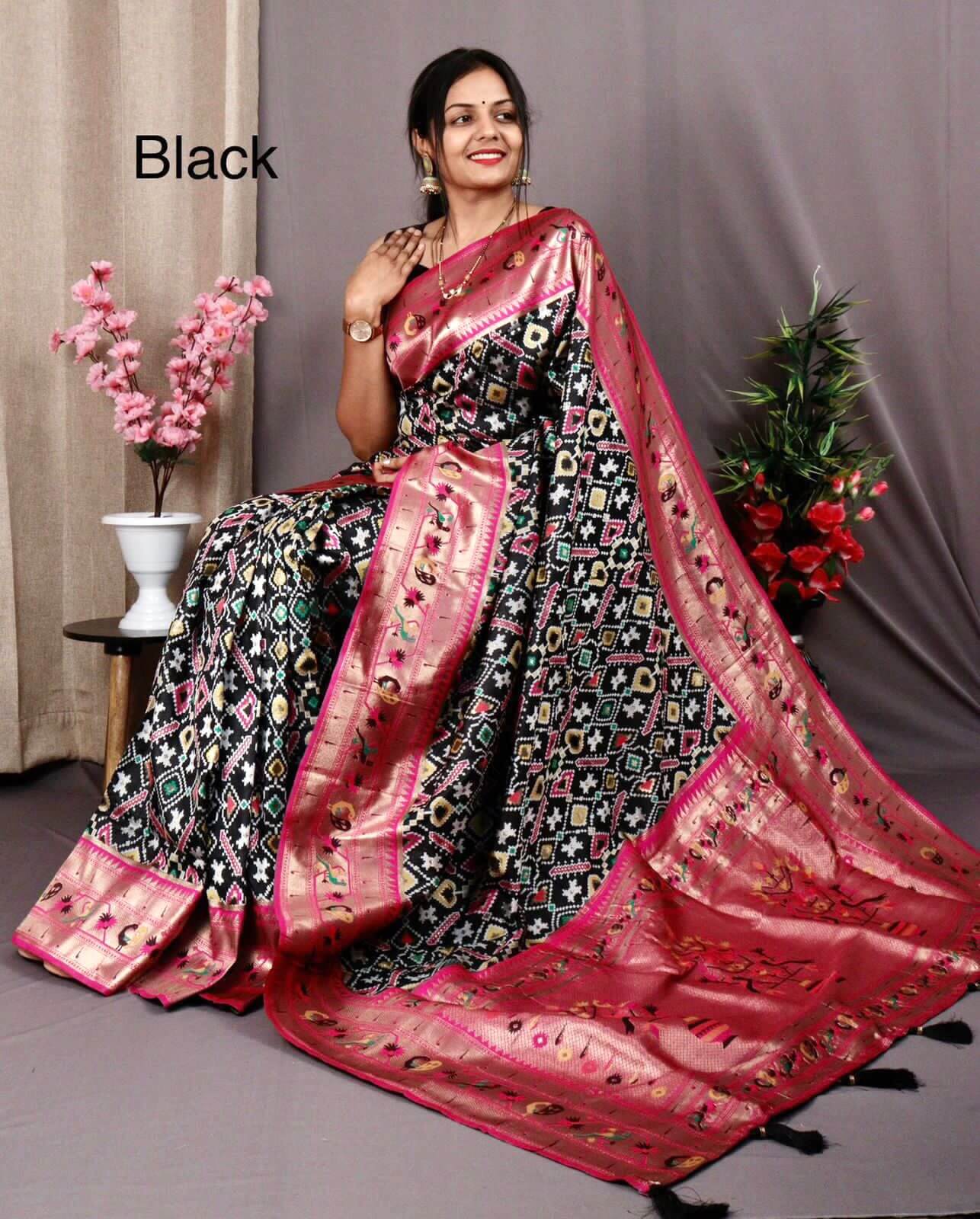 Trendy black patola silk saree
