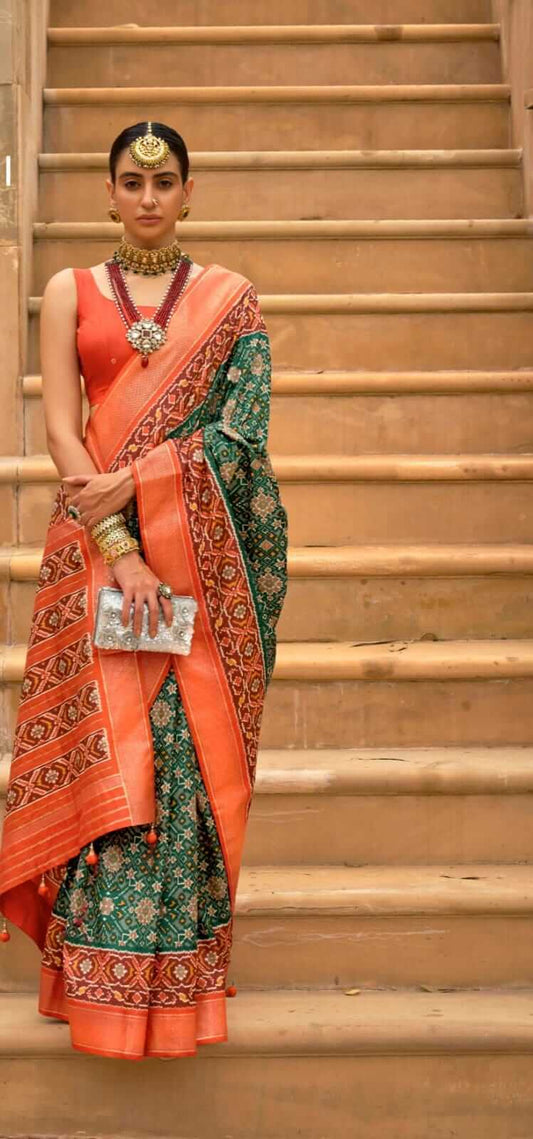 Green and orange ikkat patola designer silk saree